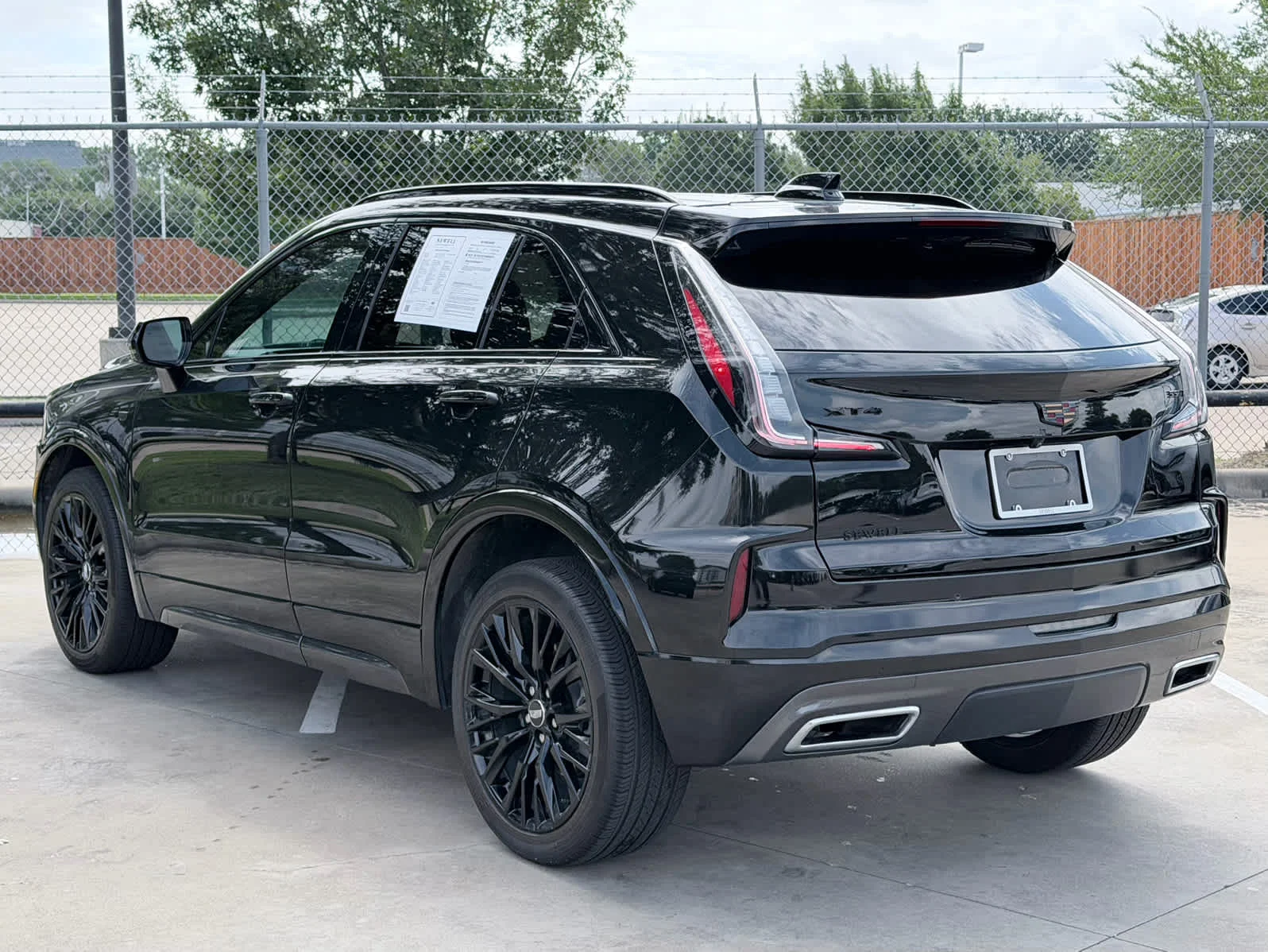 Used 2024 Stellar Black Metallic Cadillac Sport image 6