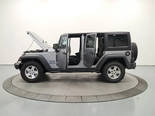 Used 2015 Silver Jeep Unlimited Sport image 13