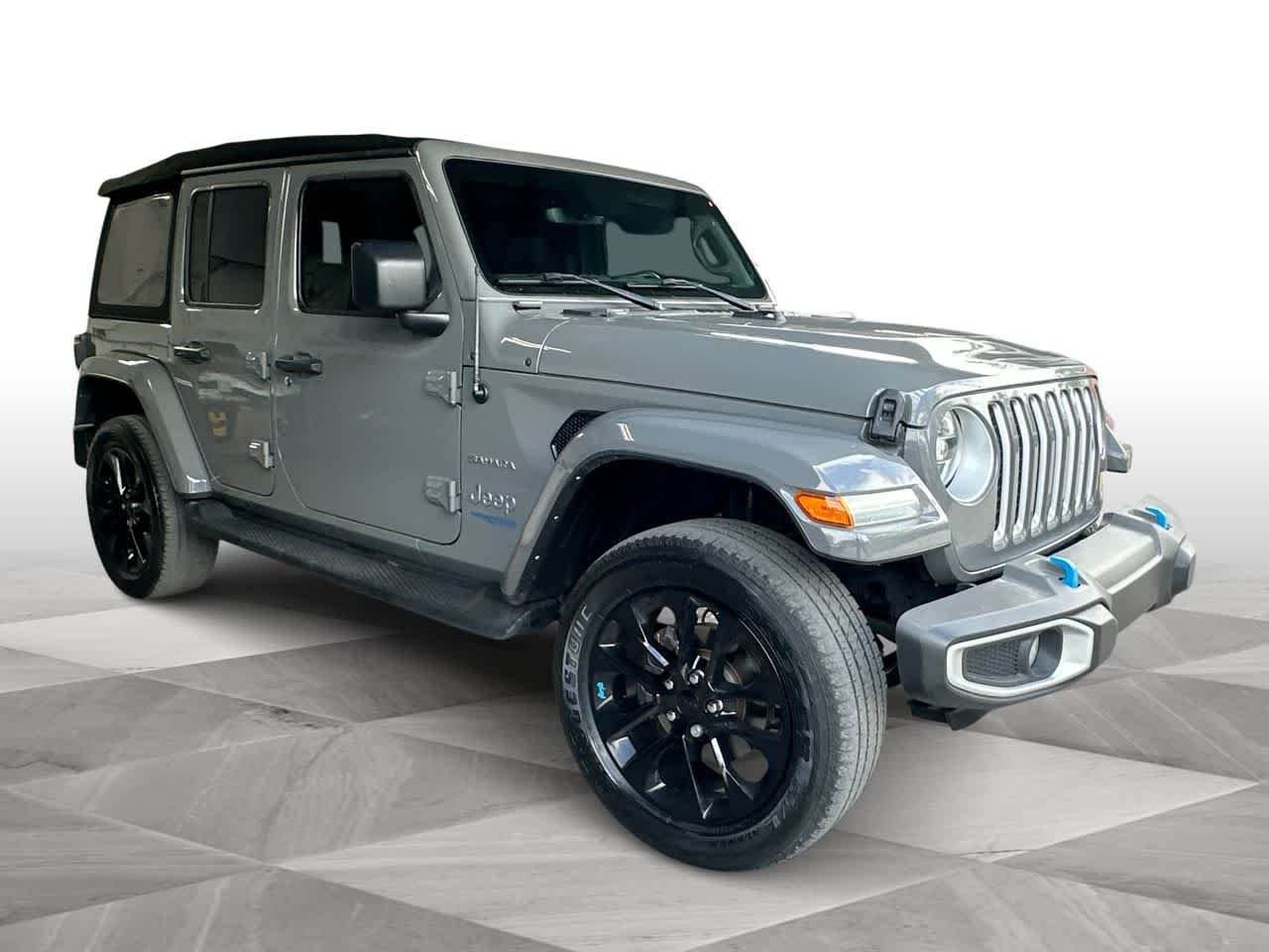 Used 2022 Jeep Wrangler Unlimited Sahara 4XE with VIN 1C4JJXP69NW120615 for sale in Miami, FL