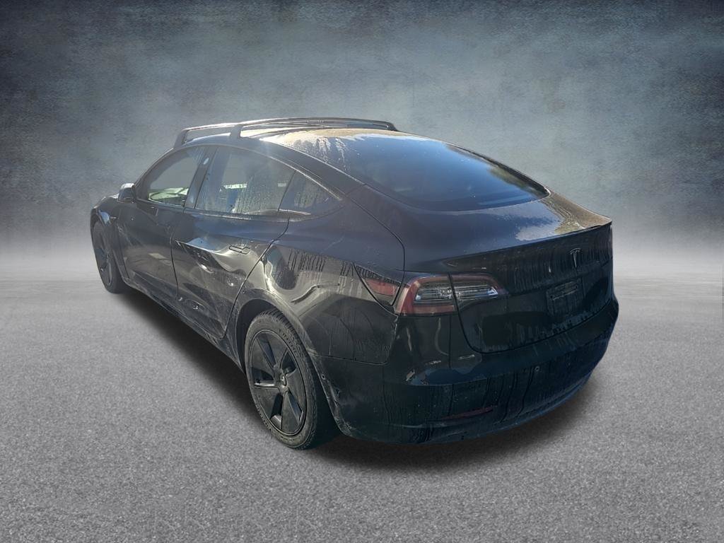 Used 2021 Solid Black Tesla Standard Range Plus image 5