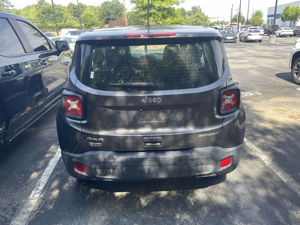 Used 2019 Granite Crystal Metallic Clearcoat Jeep Sport image 5