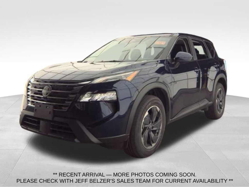 Used 2025 Deep Ocean Blue Pearl Nissan SV image 1