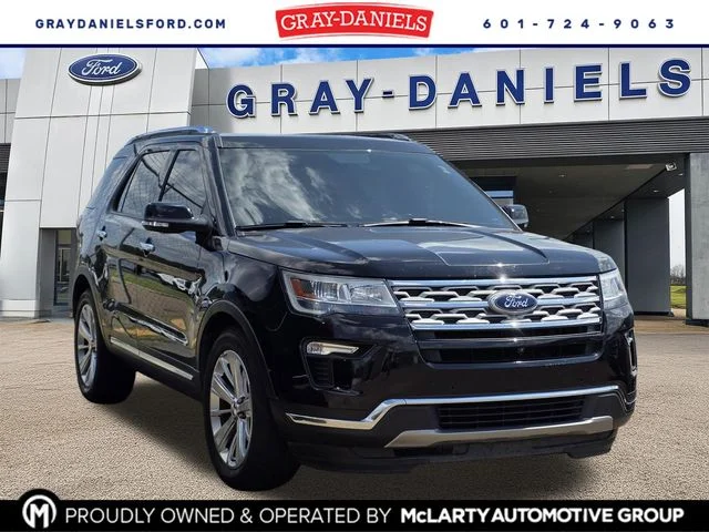 Used 2019 Black Metallic Ford Limited image 1