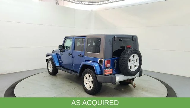 Used 2010 Blue Jeep Unlimited Sahara image 7