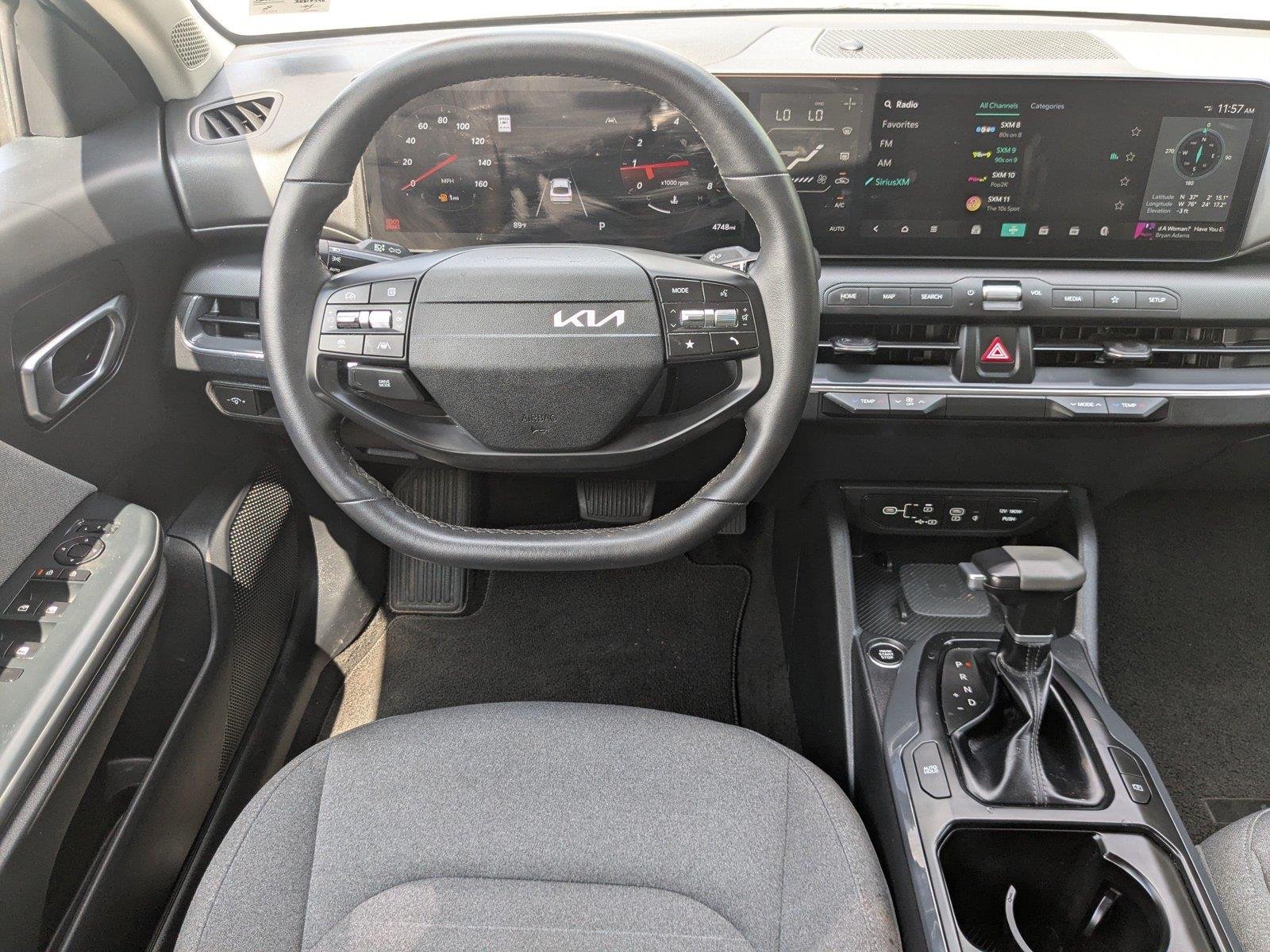 Used 2025 Aurora Black Pearl Kia EX image 14