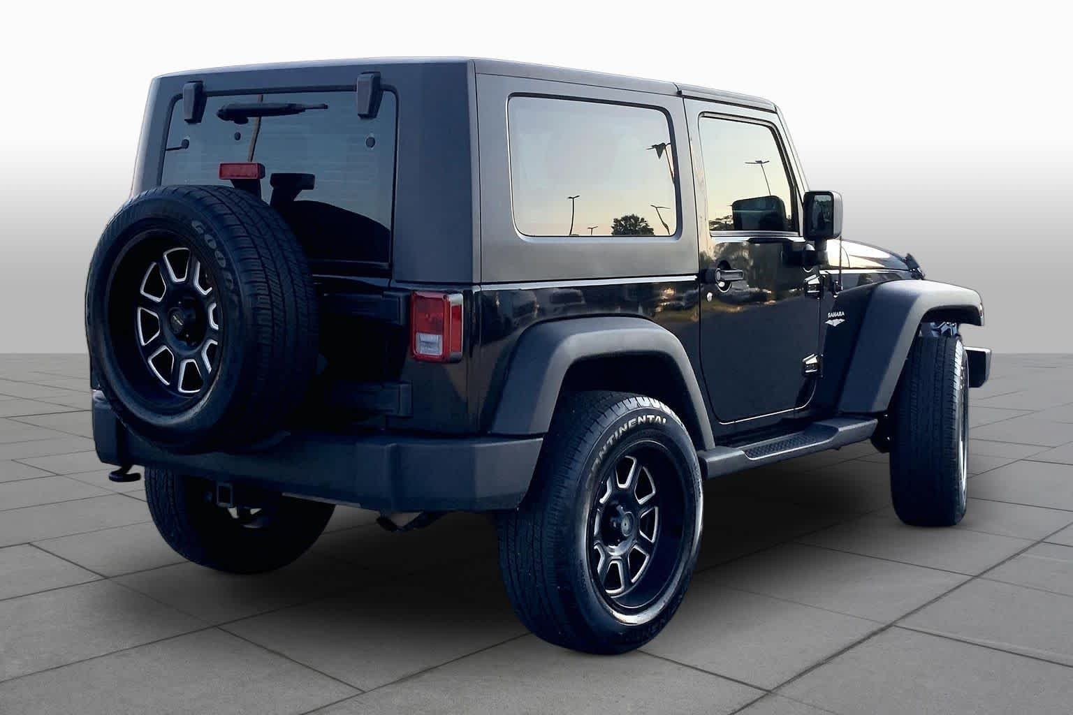 Used 2010 Black Jeep Sport image 11