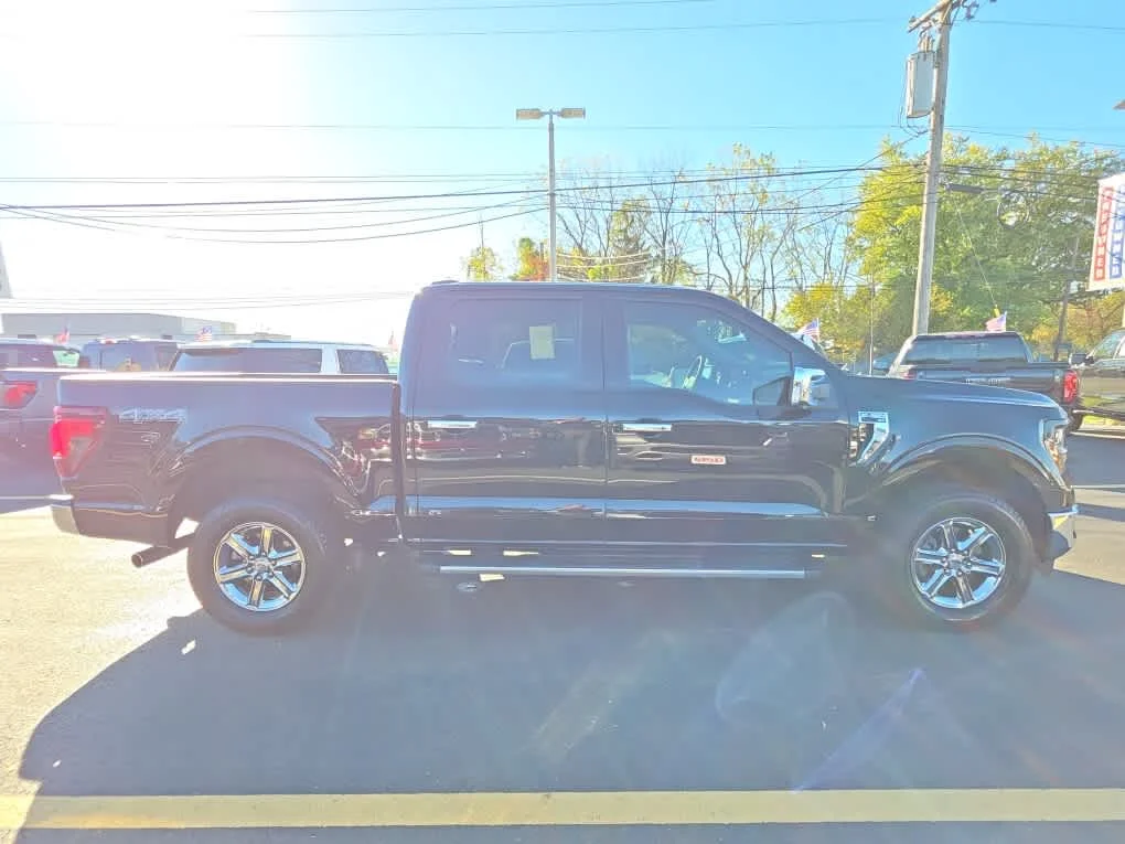 Used 2025 Agate Black Metallic Ford XLT image 4