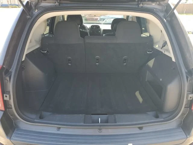 Used 2014 Granite Crystal Jeep Sport image 24