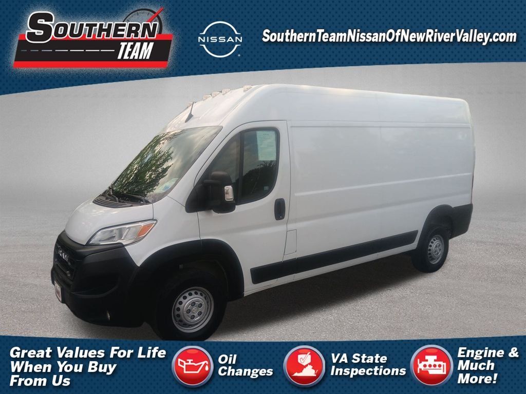 Used 2024 Bright White Clearcoat Ram High Roof image 1