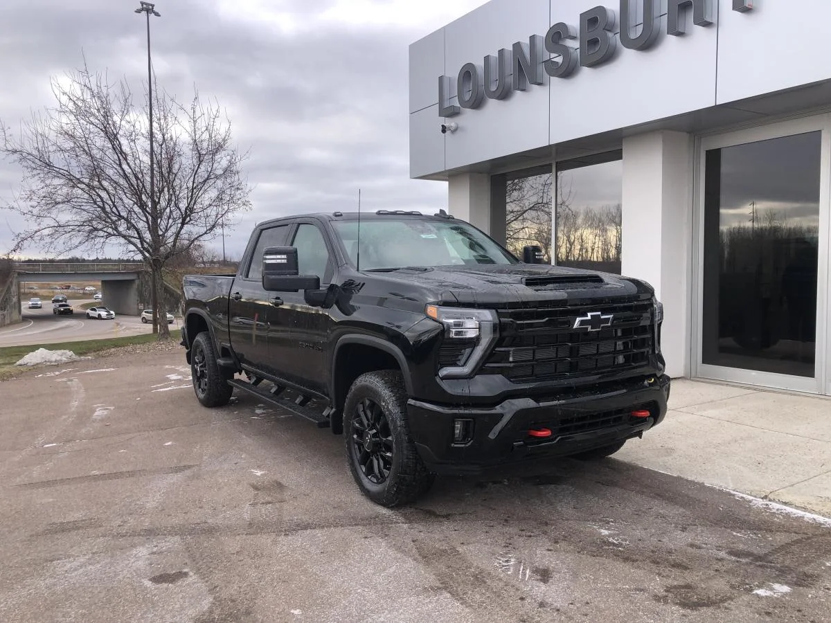 Used 2026 Black Chevrolet 4WD Crew Cab 159" LTZ image 1