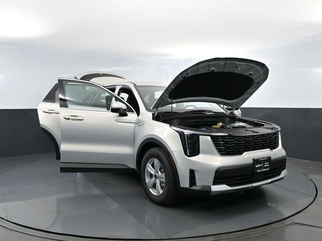 New 2026 Ivory Silver Kia LX image 29