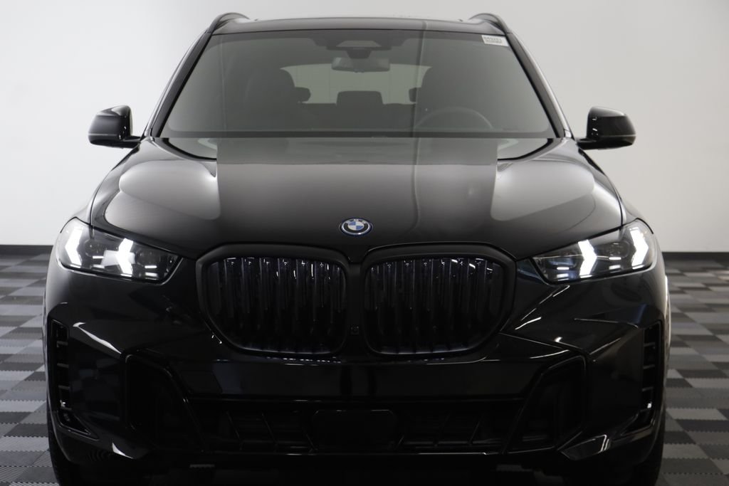 New 2026 Black Sapphire Metallic BMW xDrive50e image 23