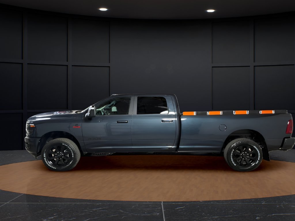 New 2027 Forged Blue Metallic Exterior Paint RAM Laramie image 2