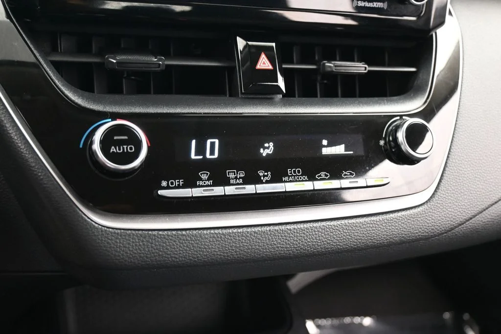 Used 2021 Super White Toyota LE image 17