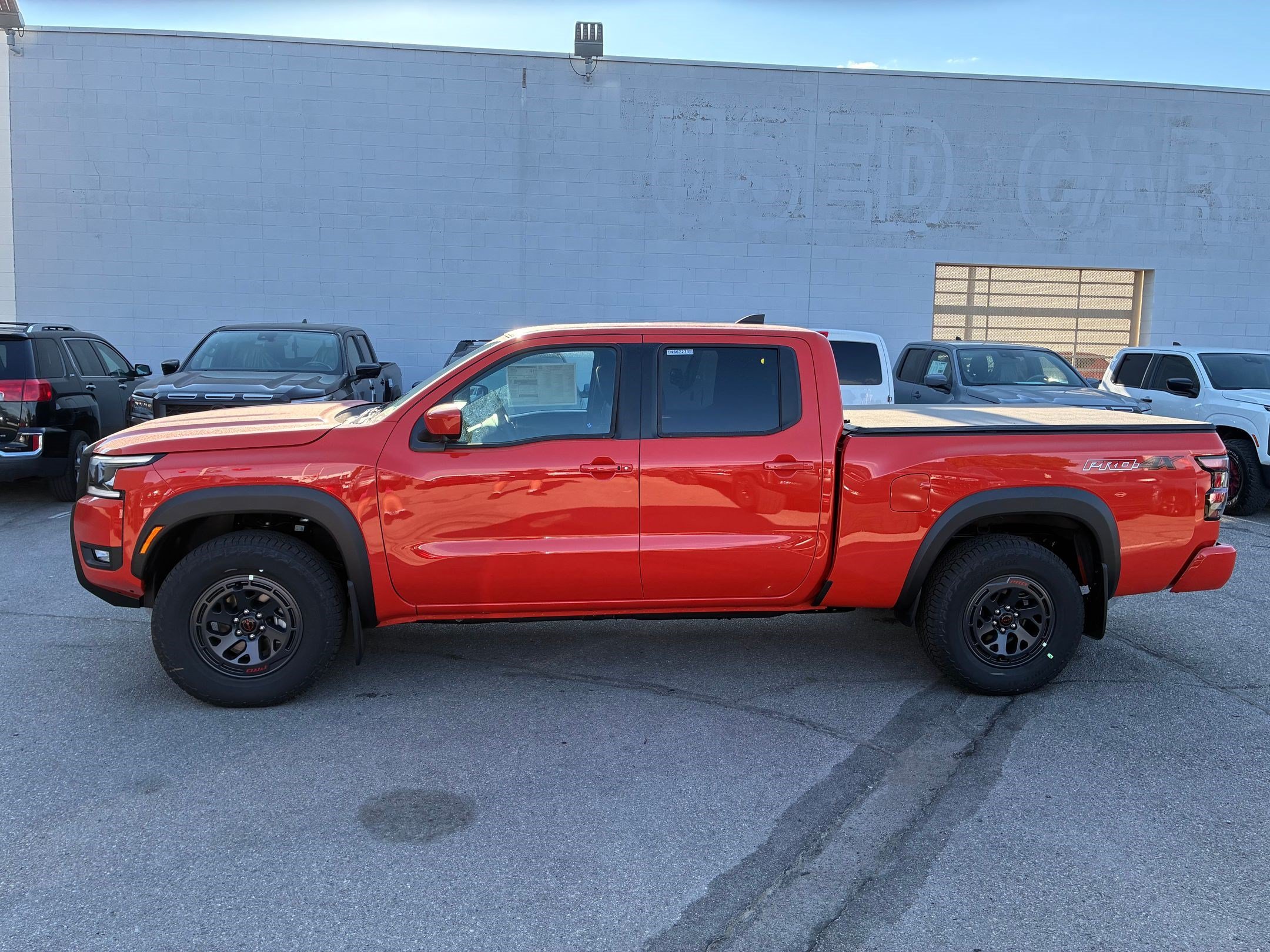New 2026 Afterburn Orange Nissan Crew Cab PRO-4X® Long Bed image 7