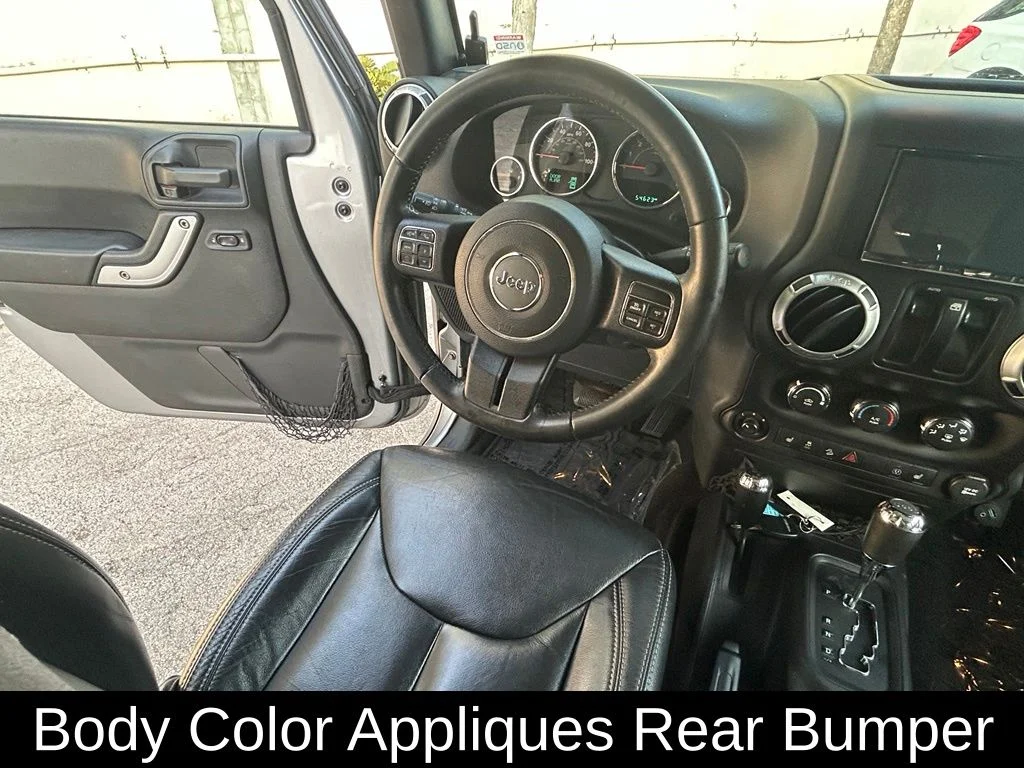 Used 2016 Silver Jeep Sahara image 9