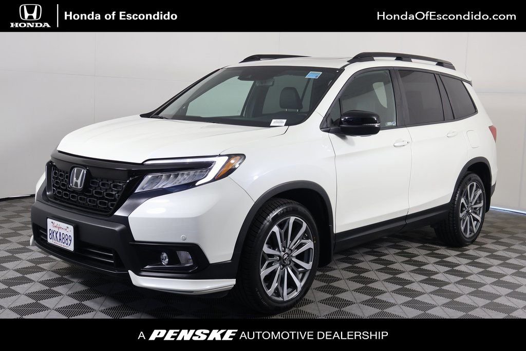 Certified Used 2019 White Diamond Pearl Honda Touring image 1