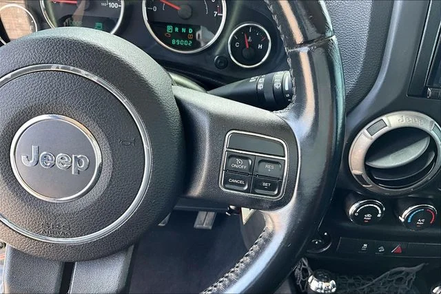 Used 2013 Black Jeep Unlimited Sport image 15