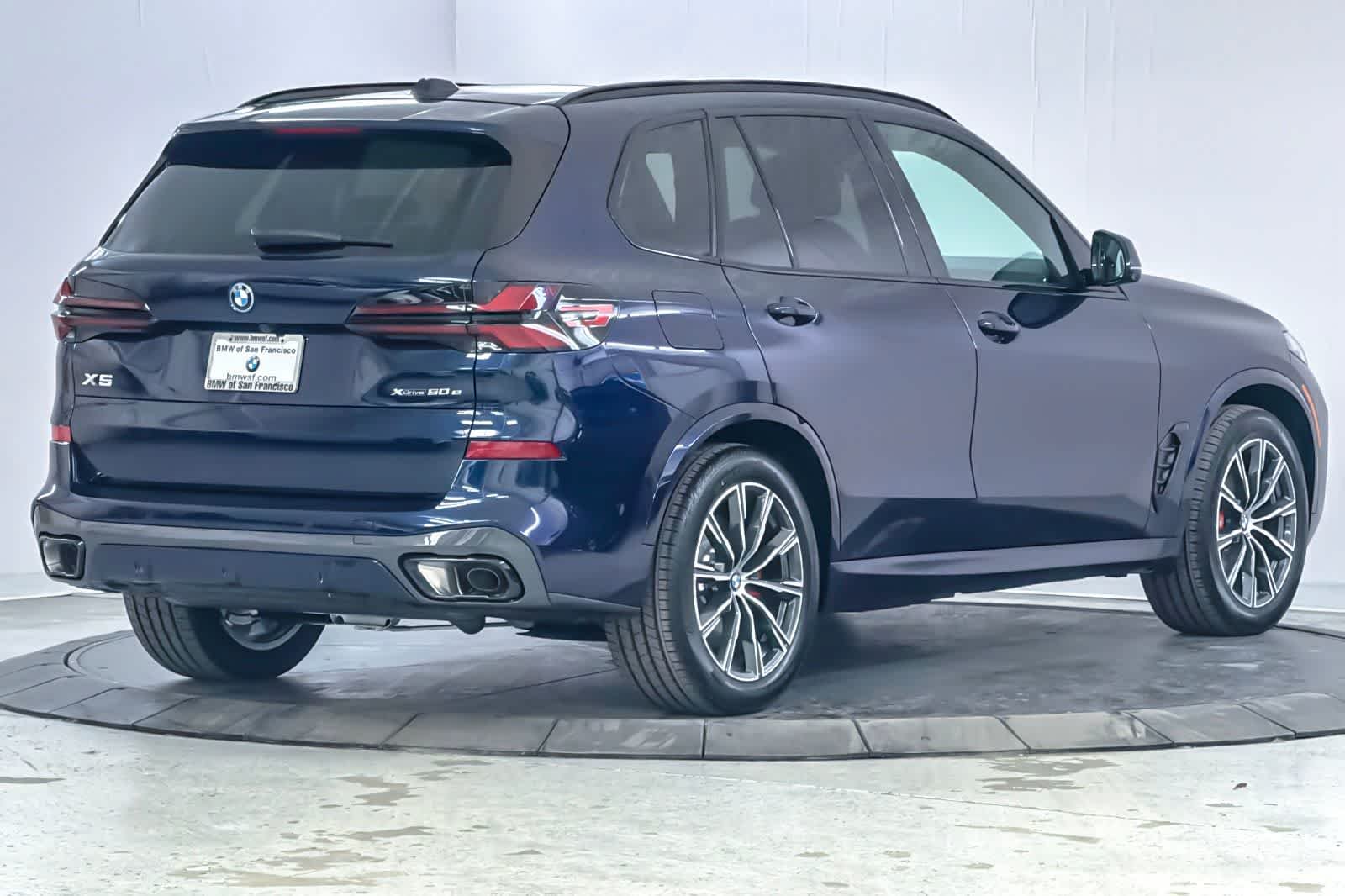 New 2026 Tanzanite Blue II Metallic BMW xDrive50e image 2
