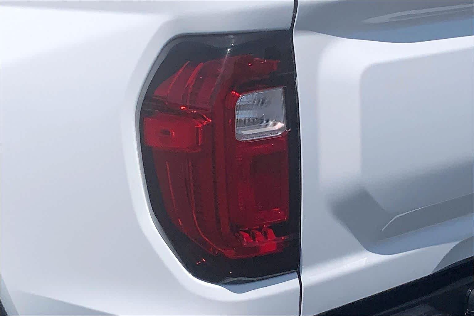 Used 2024 Summit White GMC 4WD AT4 image 58