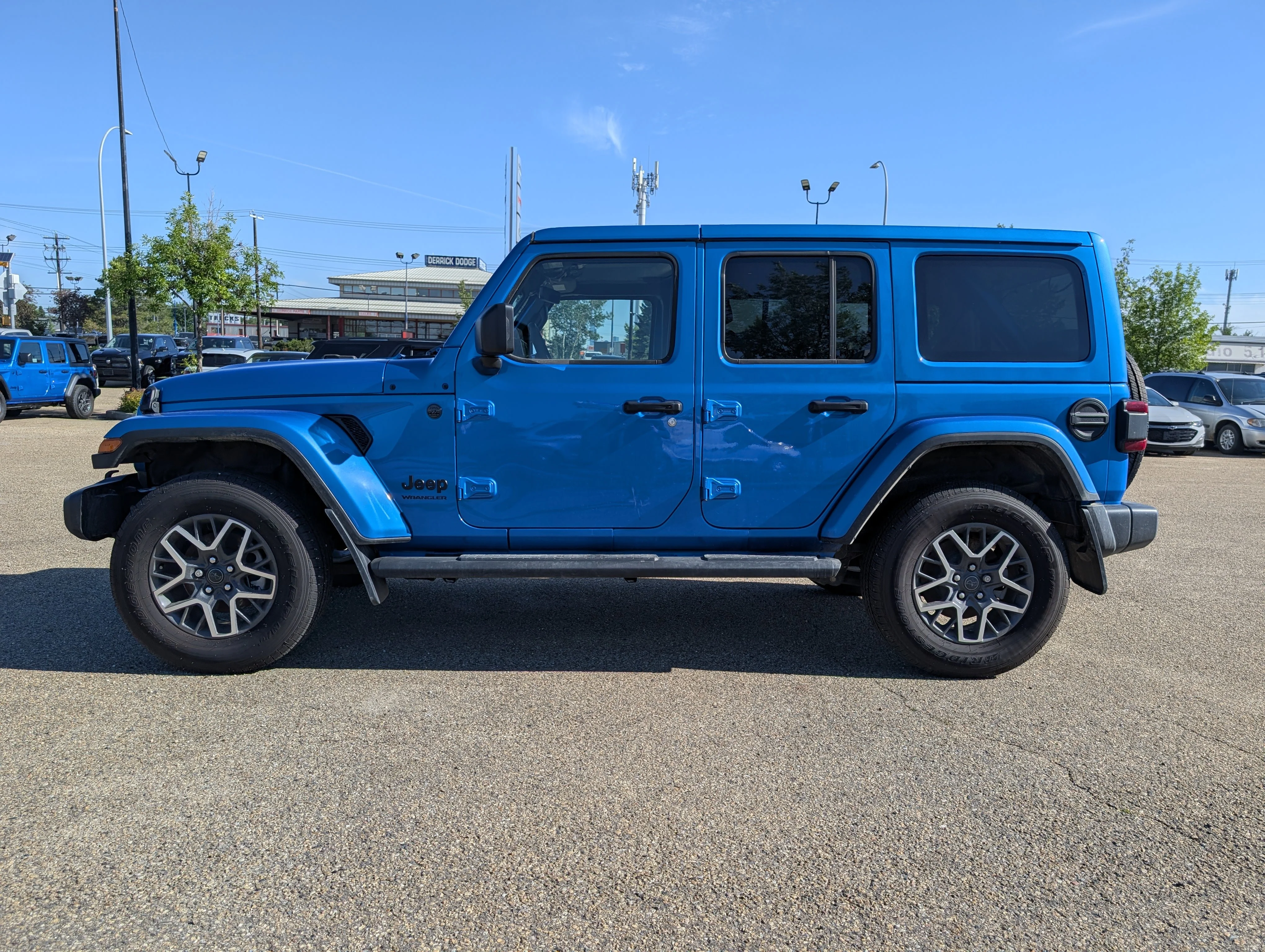 New 2025 Hydro Blue Pearl Jeep Sahara image 3