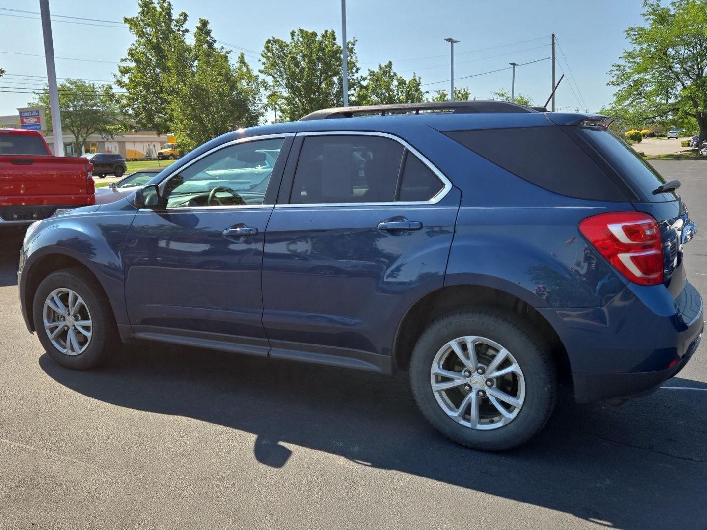 Used 2016 Patriot Blue Metallic Chevrolet LT image 4