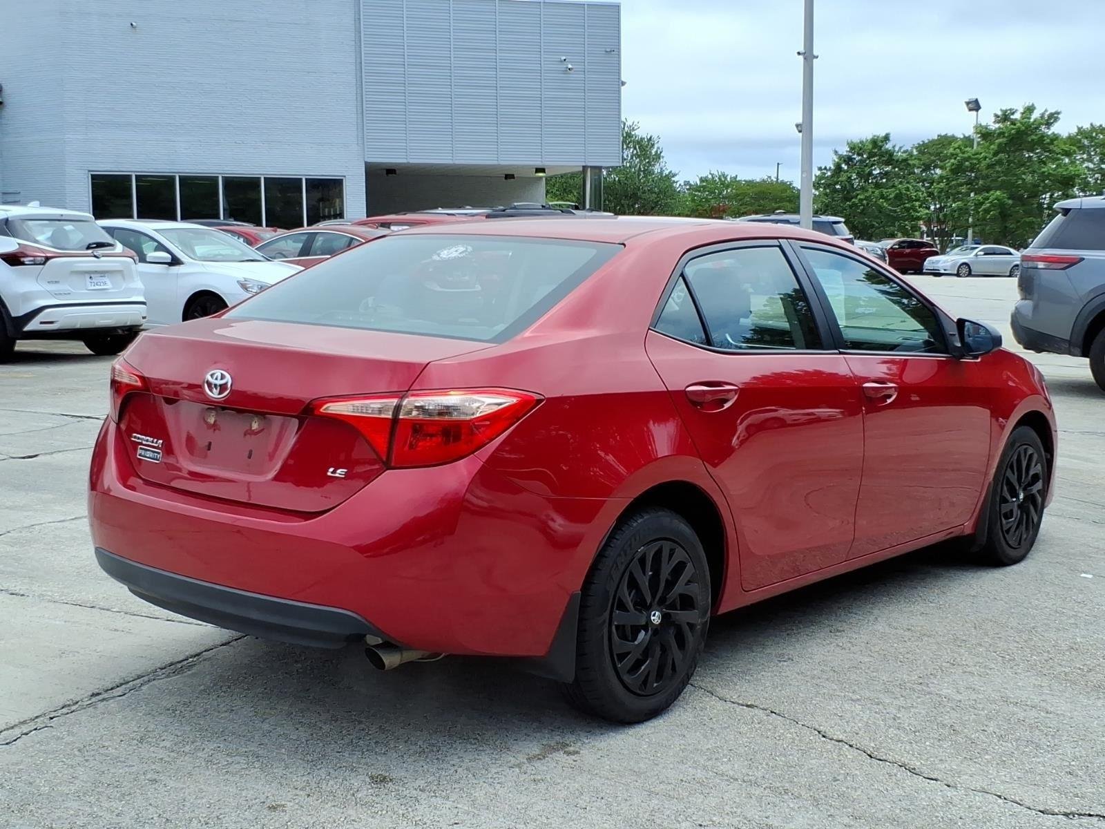 Used 2018 Barcelona Red Metallic Toyota LE image 8