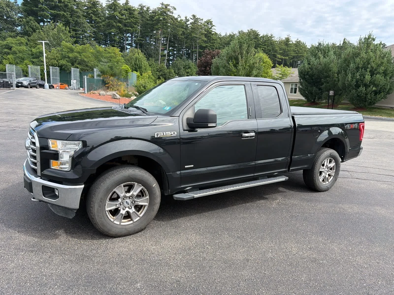 Used 2015 Tuxedo Black Metallic Ford XLT image 1