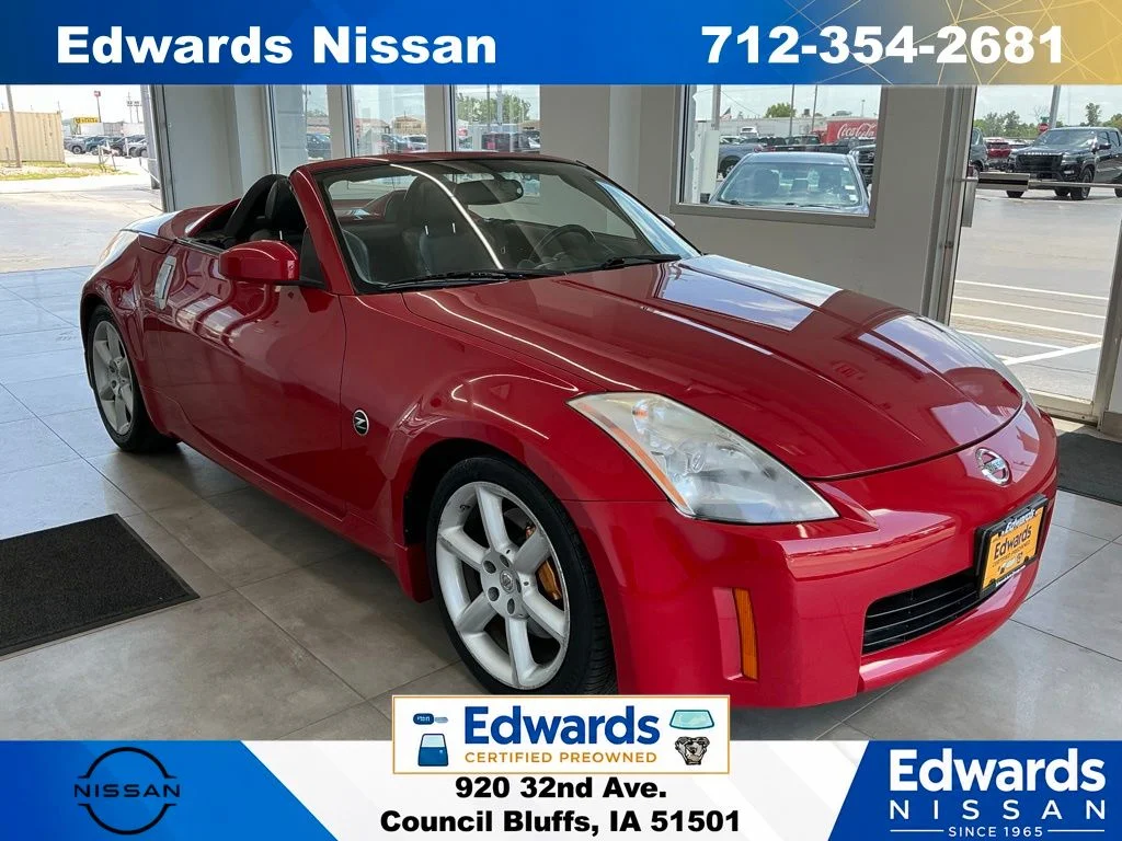 Used 2005 Red Nissan Grand Touring image 1