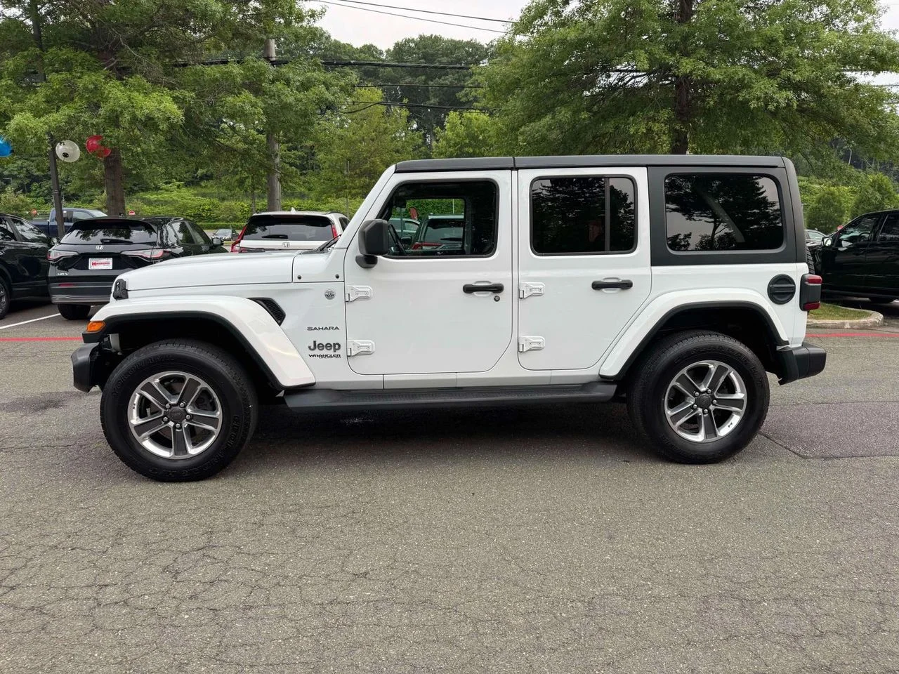Used 2020 Bright White Clearcoat Jeep Sahara 4x4 image 4