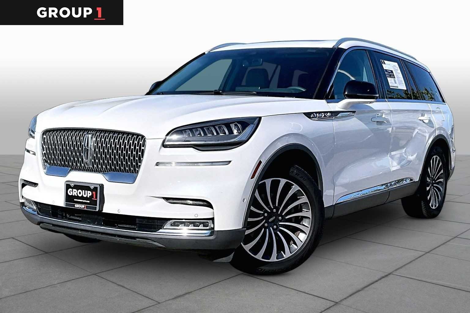 Used 2020 Pristine White Metallic Tri-Coat Lincoln Reserve image 1