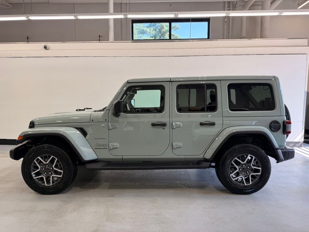 Used 2024 Jeep Wrangler 4-Door Sahara with VIN 1C4PJXEG9RW296219 for sale in Golden Valley, Minnesota
