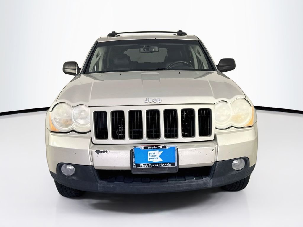 Used 2010 Light Graystone Pearlcoat Jeep Laredo image 2