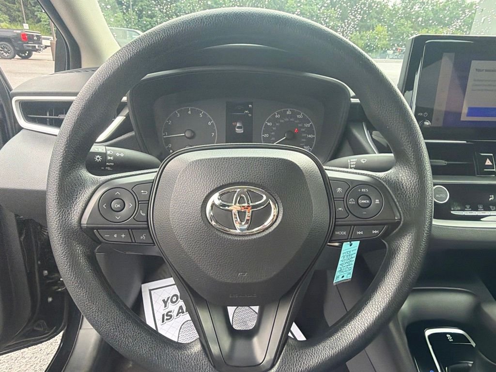 Used 2023 Midnight Black Metallic Toyota LE image 26