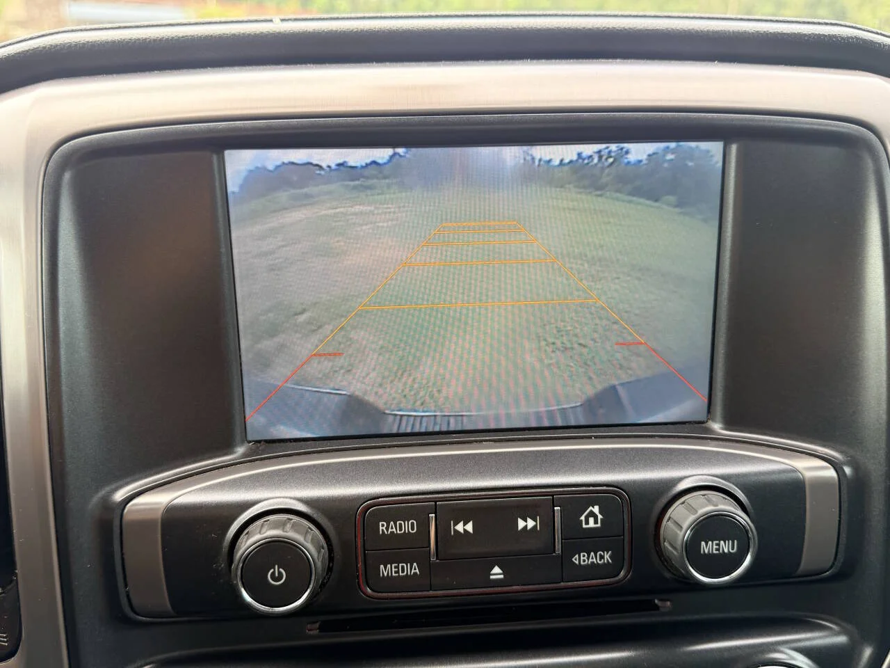 Used 2015 Gray GMC SLT 4x4 4dr Crew Cab 5.8 ft. SB image 16