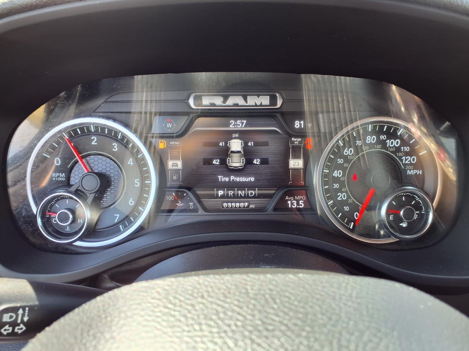 Used 2023 Diamond Black Crystal Pearl Coat RAM Laramie image 8
