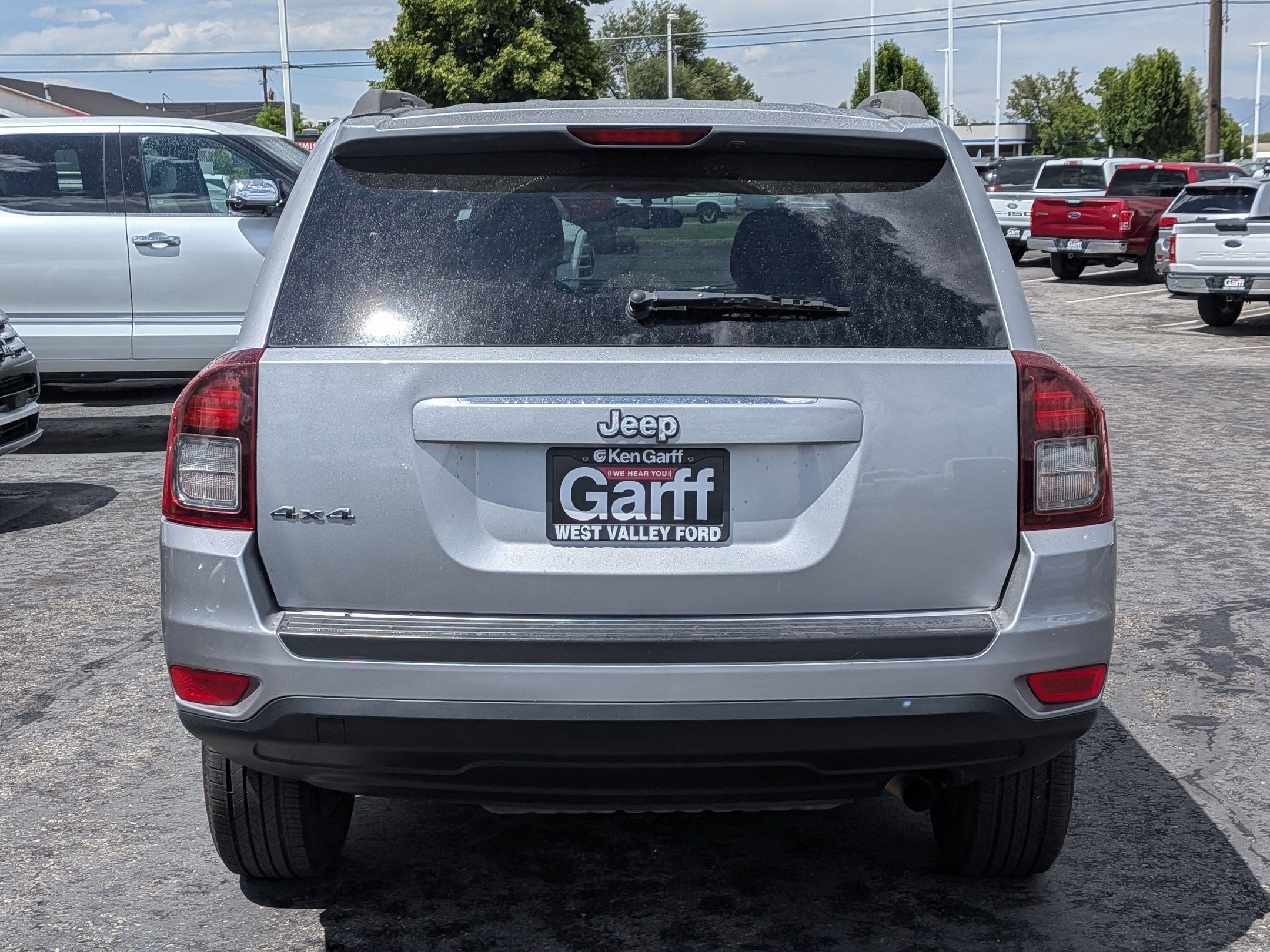 Used 2014 Billet Silver Clearcoat Metallic Jeep Sport image 4