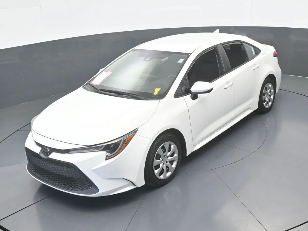 Used 2021 Super White Toyota LE image 35