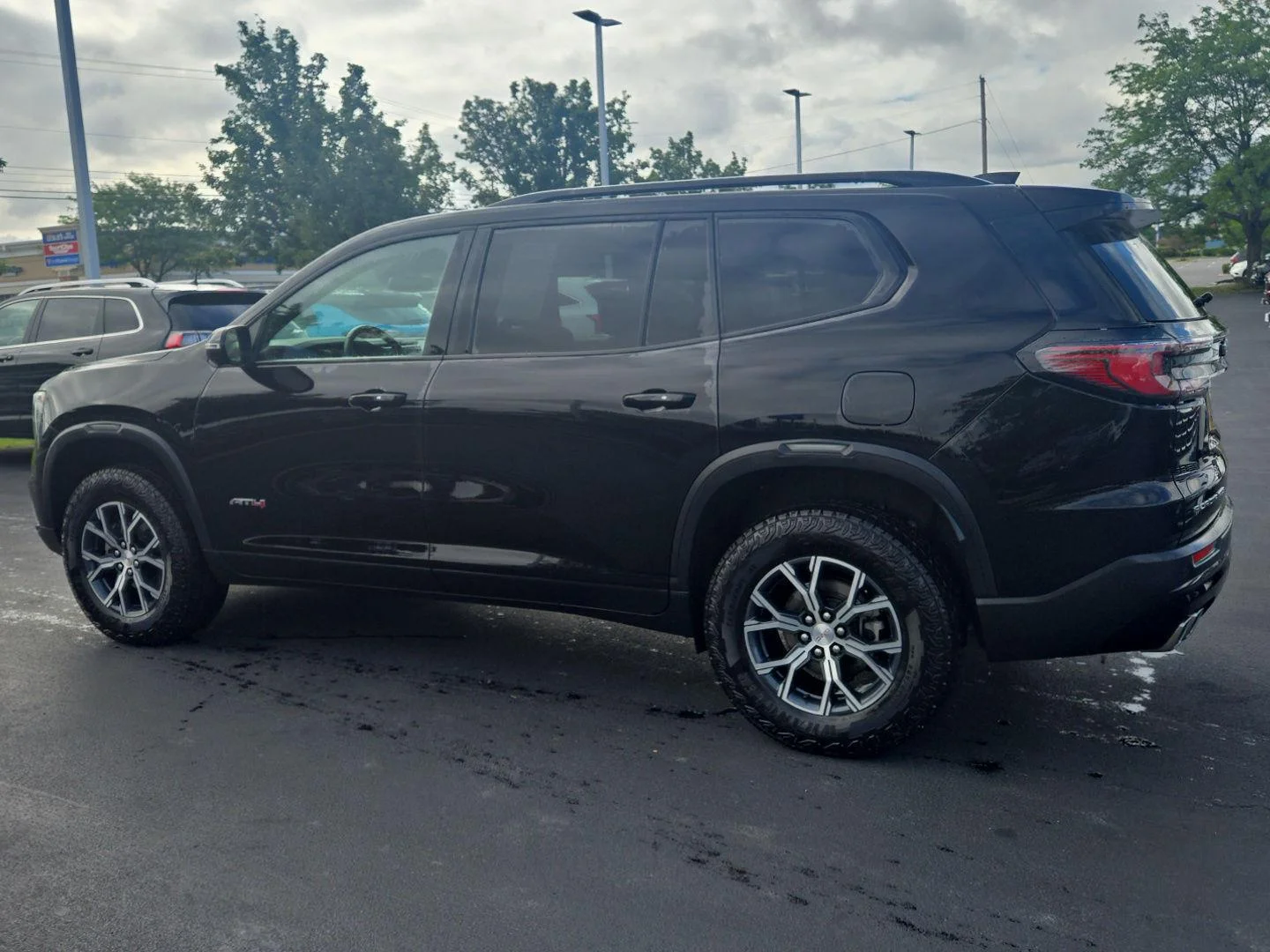 Used 2025 Ebony Twilight Metallic GMC AWD AT4 image 2