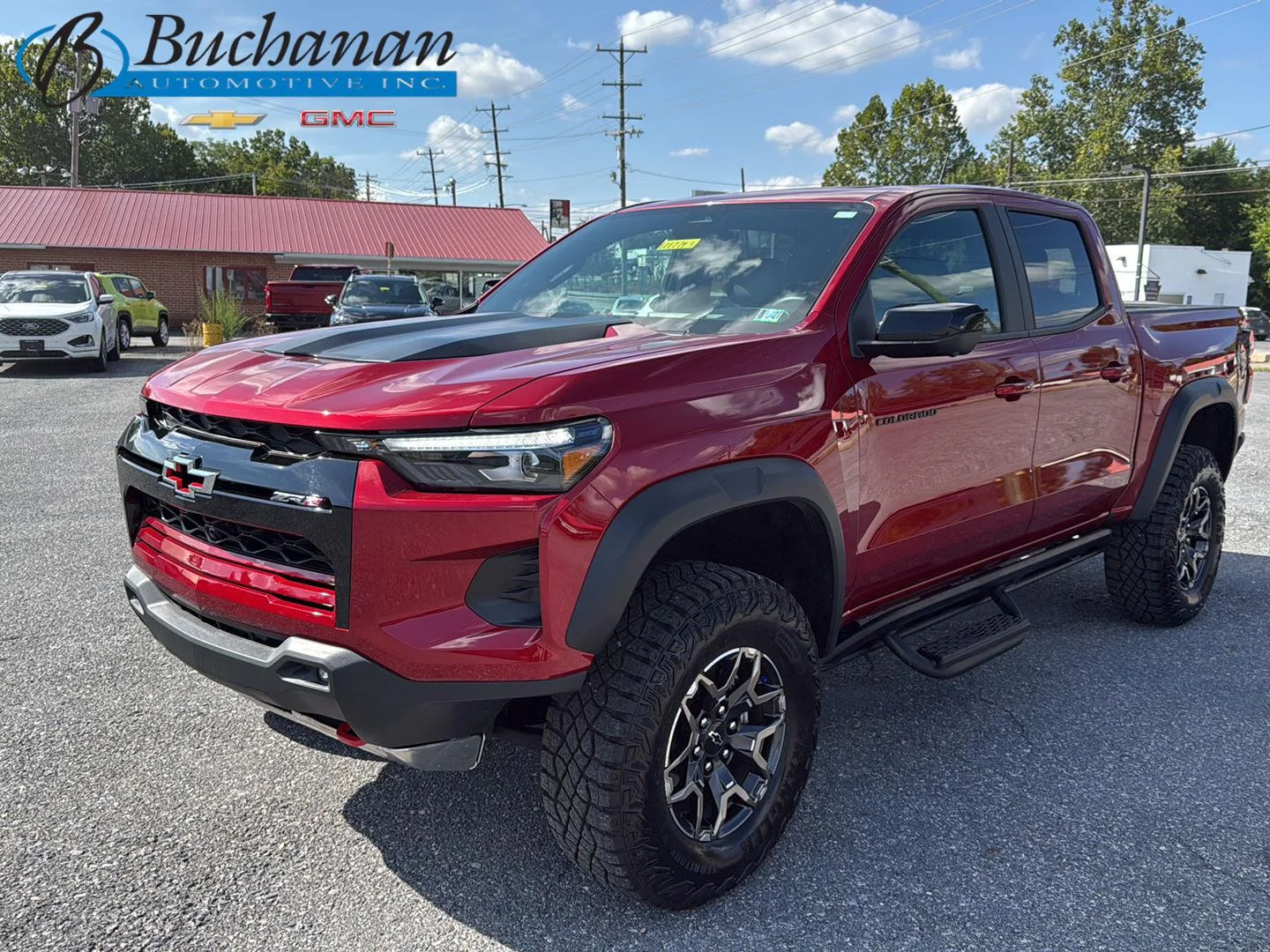Used 2025 Radiant Red Tintcoat Chevrolet ZR2 image 1