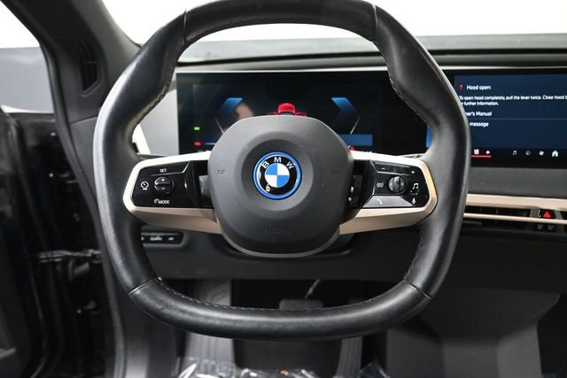 Used 2024 Black BMW xDrive50 image 13