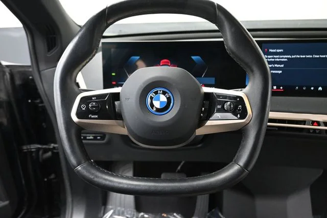 Used 2024 Black Sapphire Metallic BMW xDrive50 image 13