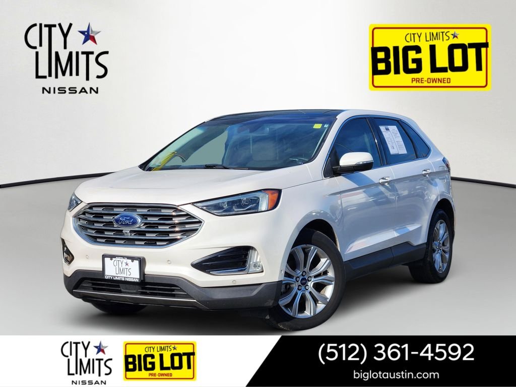 Used 2019 White Ford Titanium image 1