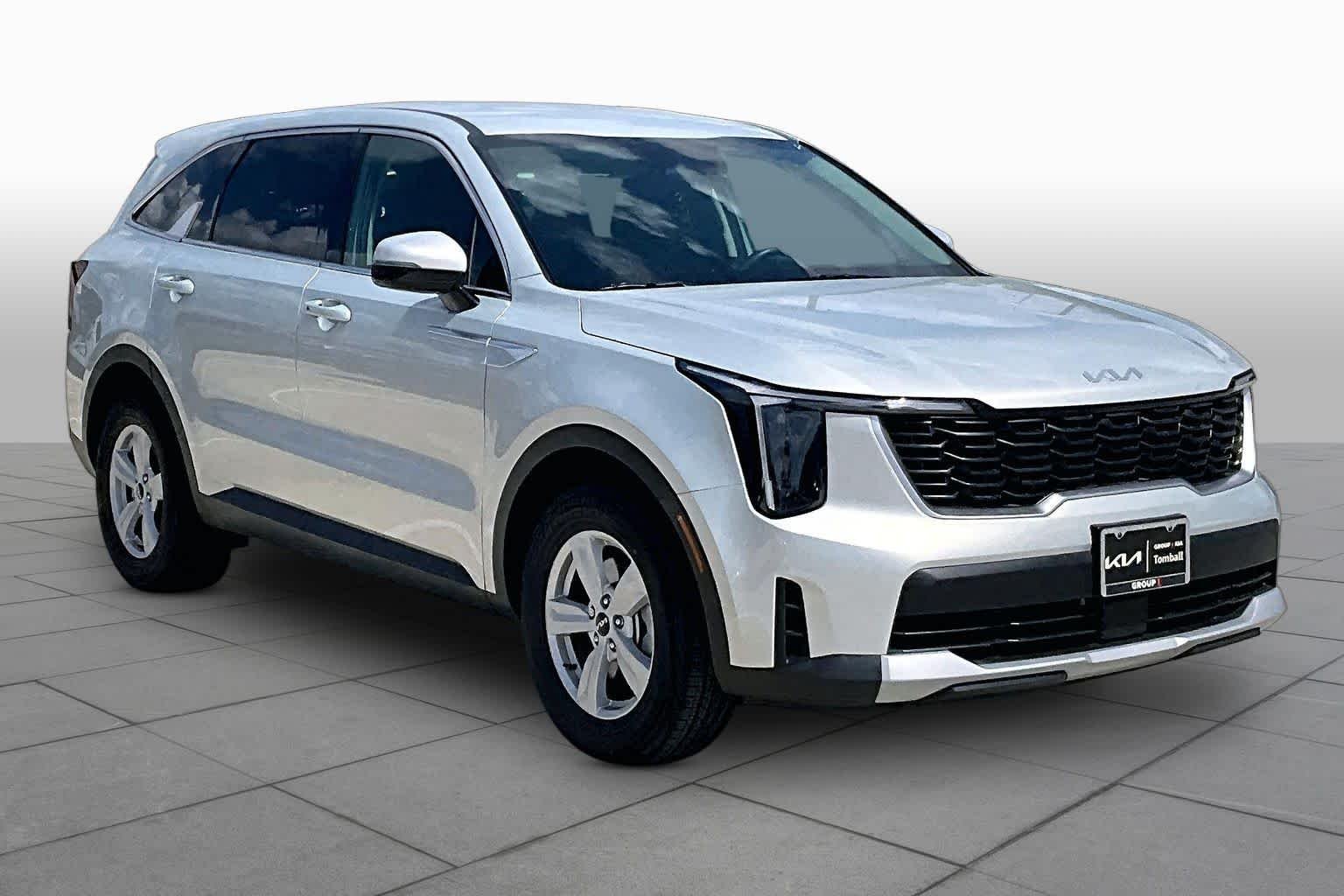 New 2026 Ivory Silver Kia LX image 3