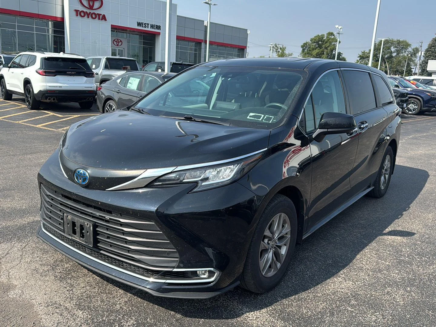 Used 2023 Midnight Black Metallic Toyota XLE image 3
