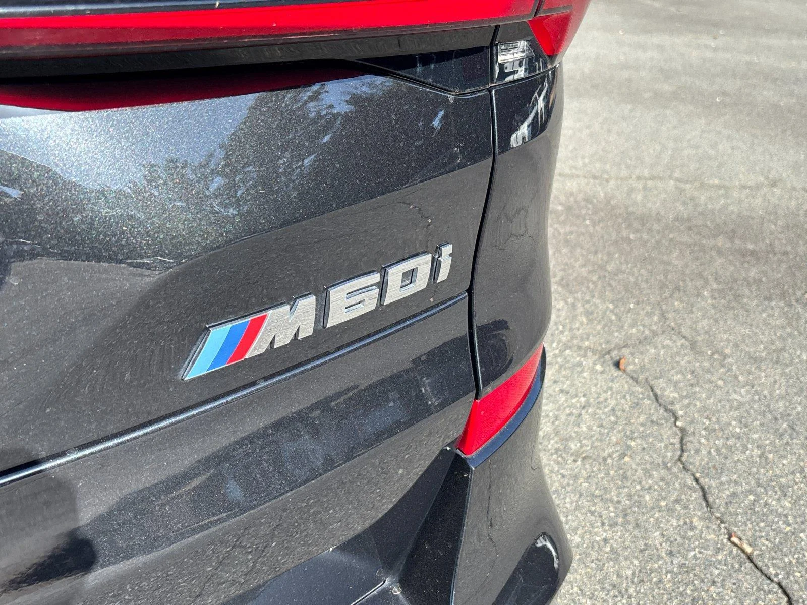 Used 2025 Black Sapphire Metallic BMW M60i image 11