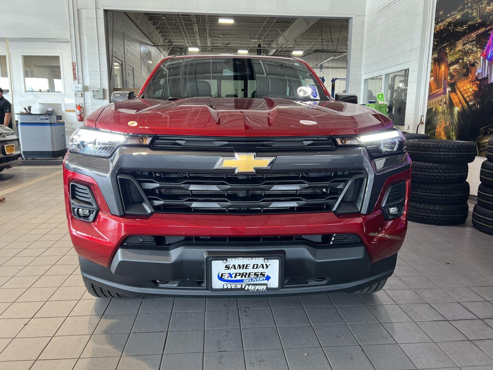 Used 2023 Radiant Red Tintcoat Chevrolet 4WD LT image 2