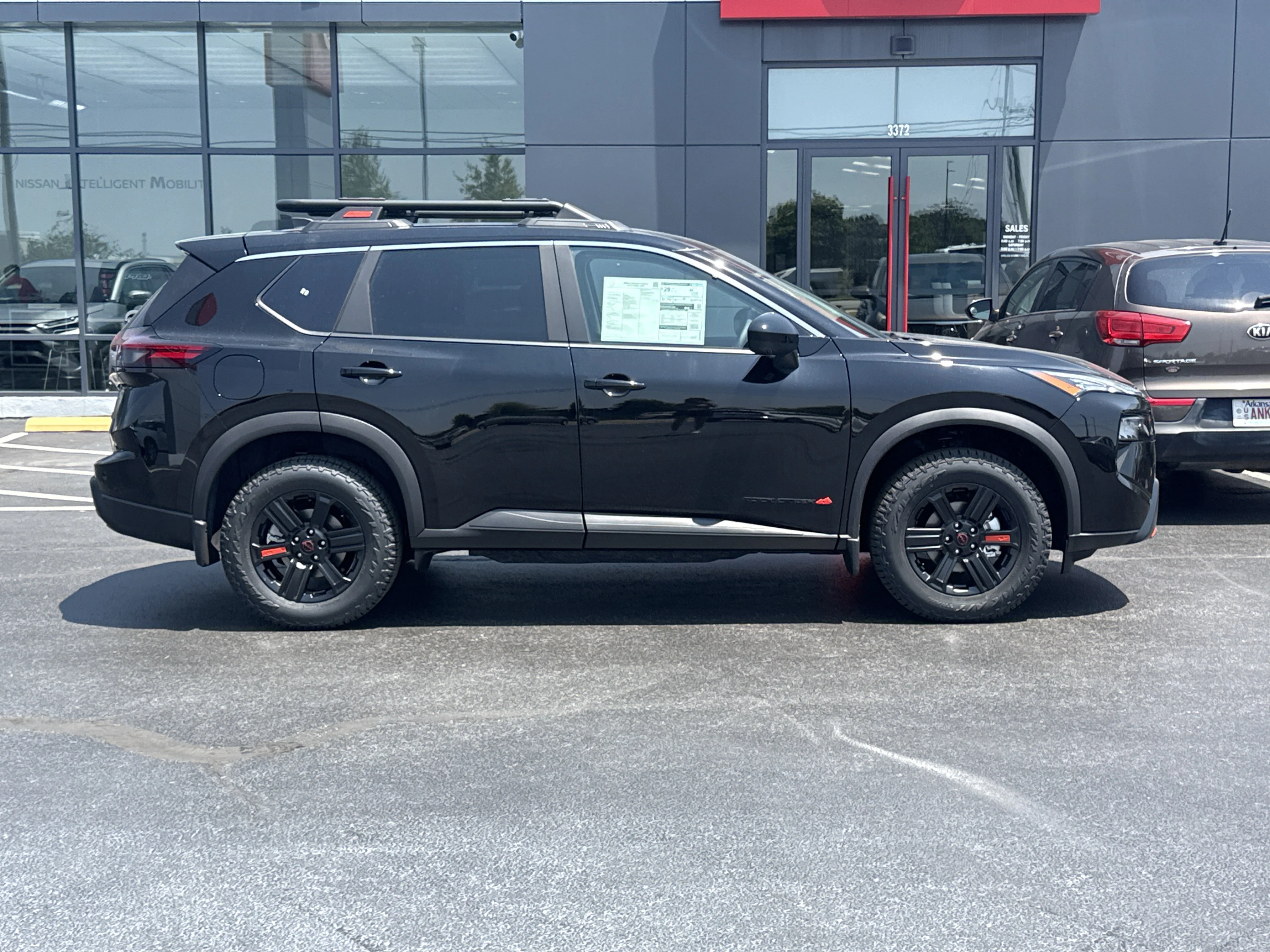 New 2026 Super Black Nissan Rock Creek AWD image 2