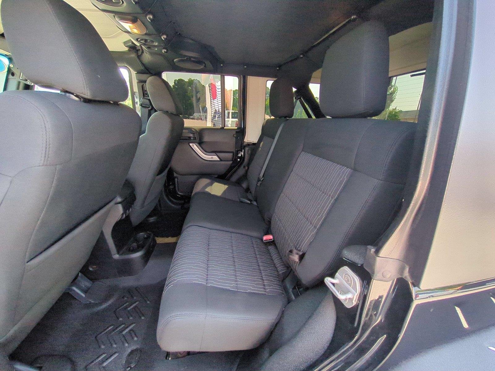 Used 2012 Black Clearcoat Jeep Sahara image 27