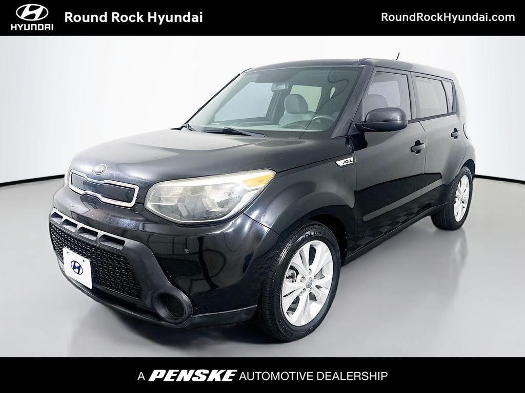 Used 2015 Black Kia Plus image 1
